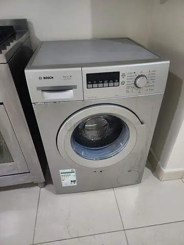 Bosch front load washing machine - 7kg, silver (used)