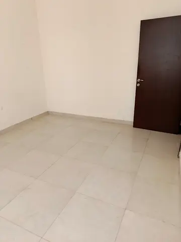 Free parking, elegant 1-bedroom apartment with 2 bathrooms and central AC in Al Majaz 3. Spacious layout, modern design, close to all services.