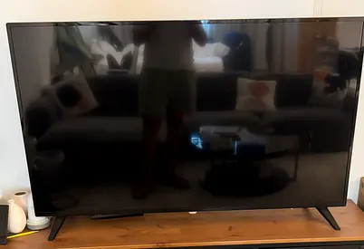 55 inch Philips TV with Stand for sale.