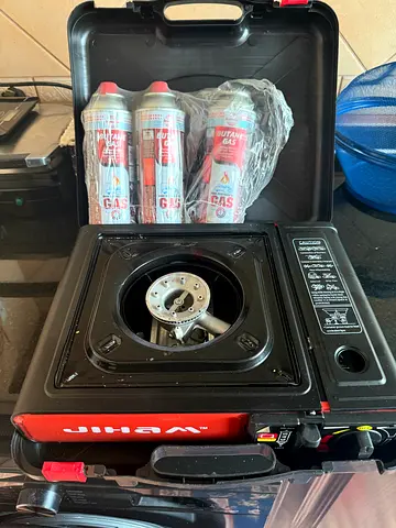Portable butane gas stove with gas canisters - rarely used