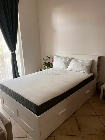 IKEA Brimnes bedframe with storage and headboard for sale