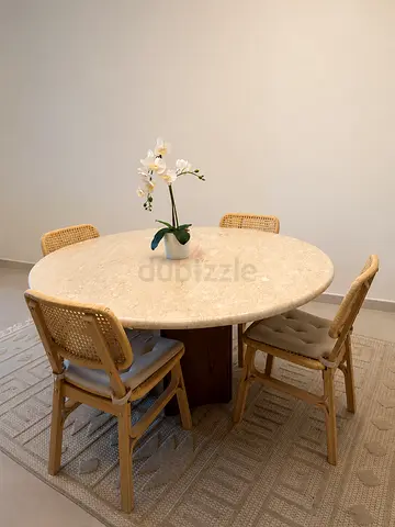 Round Marble Top Dining Table with Wooden Pedestal Base - Good Condition.3000AED still negotiable