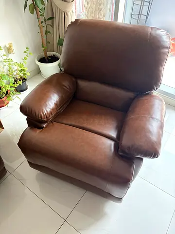 Brown leather recliner armchair