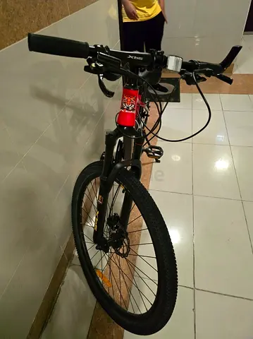 Used mountain bike - good condition, 26 wheels, front suspension