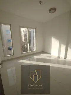 For annual rent: Two-bedroom apartment with a living room, excellent finishing and spacious areas, s