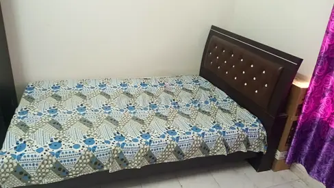 Single wooden bed with padded headboard - good condition