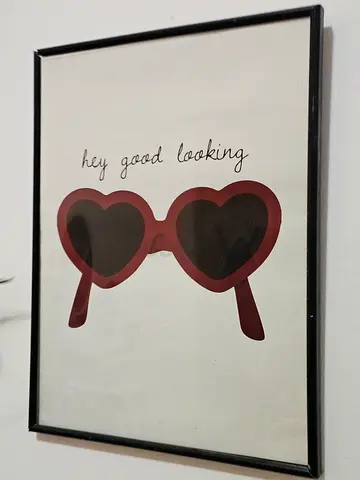 Framed wall art print with heart-shaped sunglasses - hey good looking design