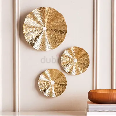 3 Golden metal decorative accents