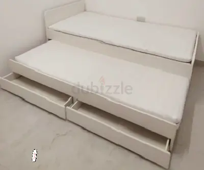 Ikea slakt bed frame with under bed and 2 storage drawers underneath with 2 Ikea mattresses