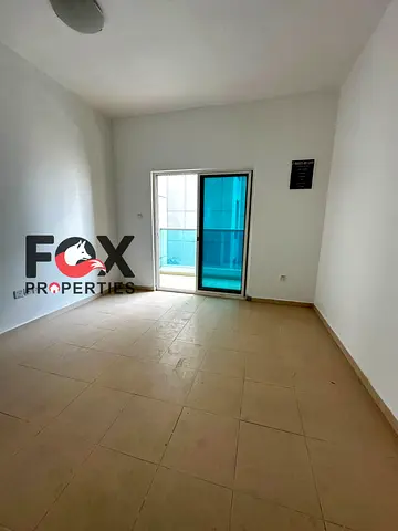 غرفة وصالة للإيجار السنوي في سيتي تاور – النعيمية 3 | مطبخ مغلق | باركينج | 29,000 درهم