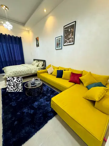 A fully furnished studio is available for rent in the Al Rashidiya area of ​​Ajman, located on Al Mina Street.