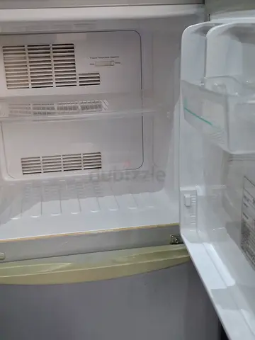 Used single-door refrigerator - interior good condition