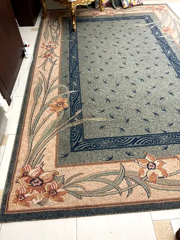 Large floral border area rug — good condition