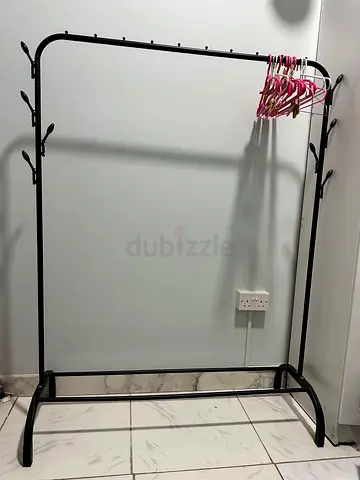 Clothes hanging stand with hangers