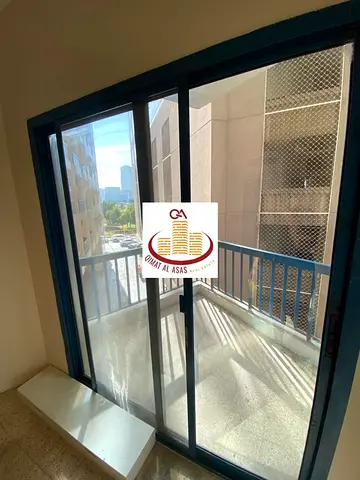 For rent: Two-bedroom apartment with two living rooms and an open view - Al Majaz 2 - Jamal Abdul Nasser Street