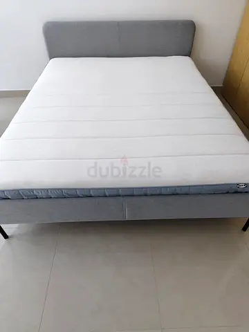 Queen grey fabric bed frame with mattress - good condition
