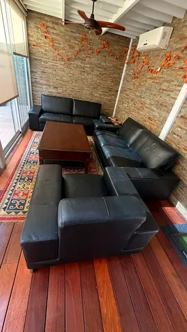 Used black leather 3-seater + 2-seater sofa set with armchair and coffee table