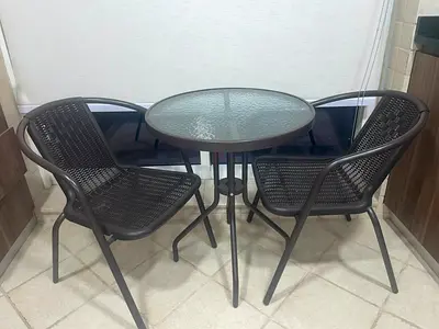 Outdoor bistro set - round glass table with 2 woven chairs