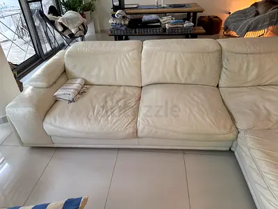 Marina Home leather L-shaped sectional sofa with chaise. Must collect.