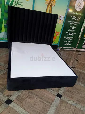 Black queen size bed for sale in good condition