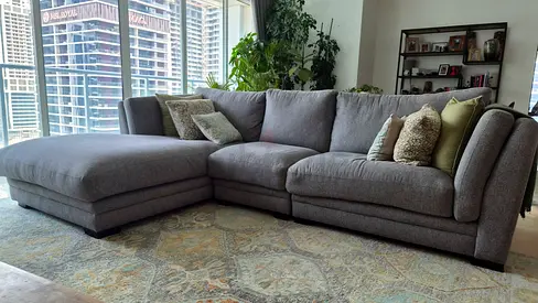 Large L-shaped grey fabric sofa with chaise - comfortable 4-seater corner sofa