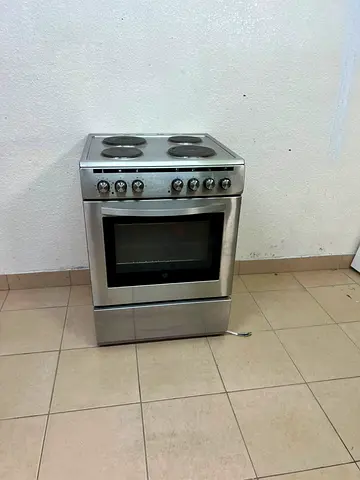 Used freestanding electric cooker with oven - stainless steel