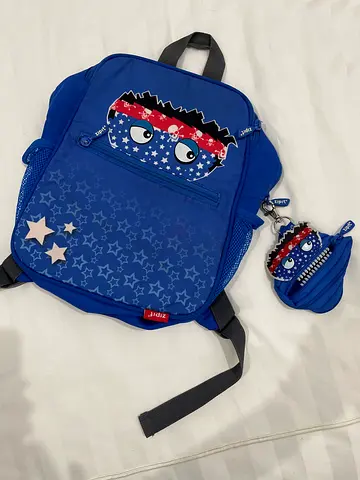 Blue kids backpack with matching coin pouch - light use