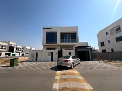 For rent in Al-Amrah: A villa featuring 5 master bedrooms, a majlis, two living areas, and a maid