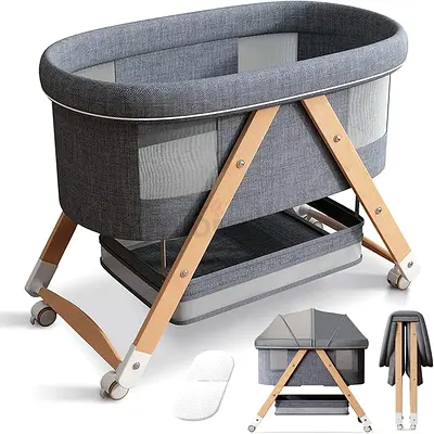Modern Foldable Grey Baby Bassinet with Wooden Legs and Wheels