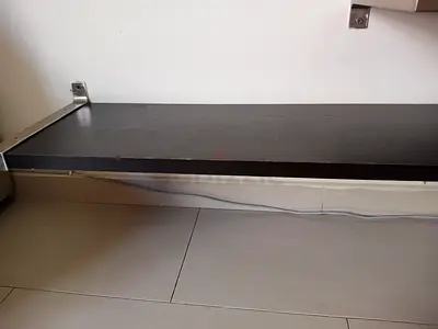 Wall-mounted floating shelf - dark wood, sturdy metal brackets