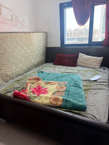 Queen-size leather upholstered bed frame with mattress AED 350