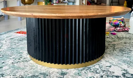 Round Coffee Table with Wooden Top and Black Ribbed Base