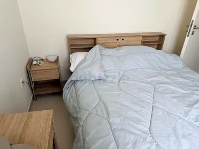 Modern Wooden Bed with Storage Headboard and Matching Nightstand and a Dresser