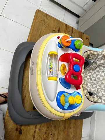 Baby walker with activity tray and padded seat - good condition