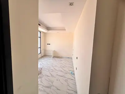 2BR apartment in Al Jurf 3, modern finish, panoramic view, free maintenance.