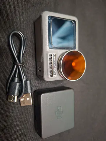 DJI Osmo Action camera with CPL filter, spare battery and USB cable