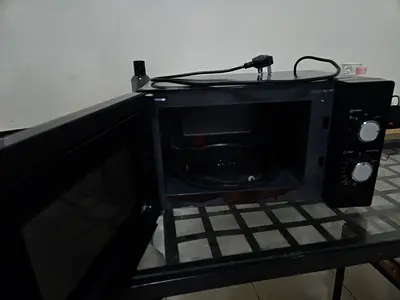 Used countertop microwave oven - good working condition. Extensively Used