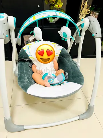 Baby electric swing seat with music Juniors brand - gently used