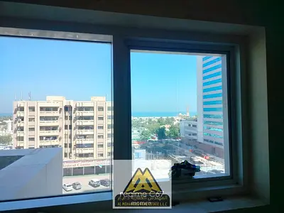 غرفه وصاله مع بلكونه باطلاله مفتوحه بابراج عجمان ون الراشدية3 بجوار جميع الخدمات والطرق الرئيسيه
