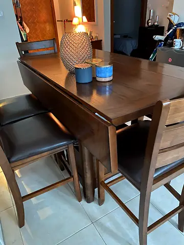 Wooden dining table and chairs (4 chairs, one bench)