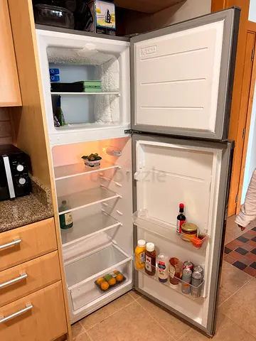 Tall white fridge freezer, working condition, good storage (collection only)