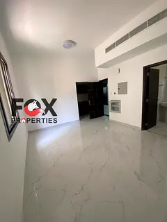 Annual studio for rent in Ajman, Al Rumaila 1. Brand new building, first tenant, separate kitchen, A