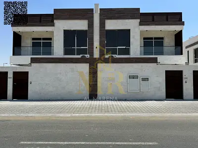 Villa for rent in Al Hooshi, Sharjah, with a modern design and spacious areas, equipped with an ele