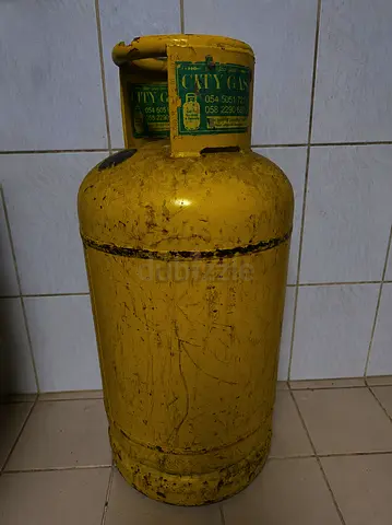 Used yellow LPG gas cylinder - city gas, standard size