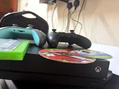 Xbox One X console with two controllers and 3 games - good working condition