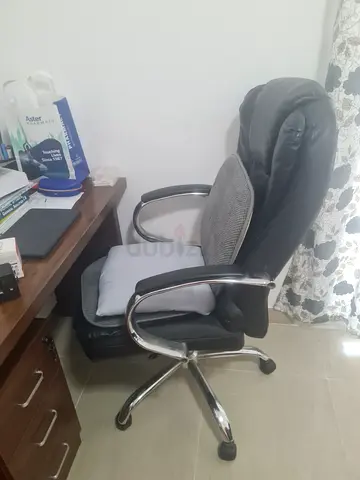 Comfortable Black Leather Office Chair with Chrome Base And Table