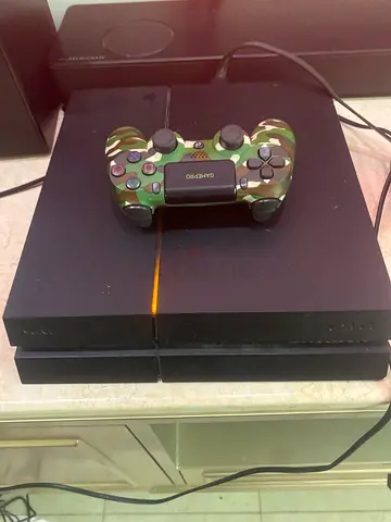 PS4 with cd and controller