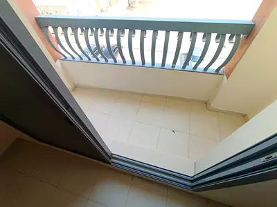 Annual Rental in Al Majaz 2, Sharjah. Spacious 2 Bedroom Apartment with a bright living room, open view, 2 balconies, 2 bathrooms, kitchen, and centra