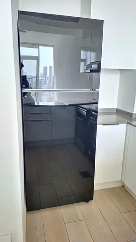 Samsung refrigerator latest model black colour same like new condition