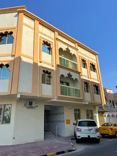 For sale, a ground floor and two floors building in Al Nuaimiya 2, Ajman City.